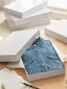 Boîte vêtement avec couvercle